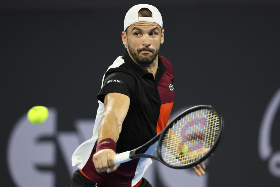 Grigor Dimitrov of Bulgaria plays a shot in his semi-final match against Jordan Thompson of Australia during the Brisbane International tennis tournament in Brisbane, Australia, Saturday, Jan. 6, 2024. (AP Photo/Tertius Pickard)