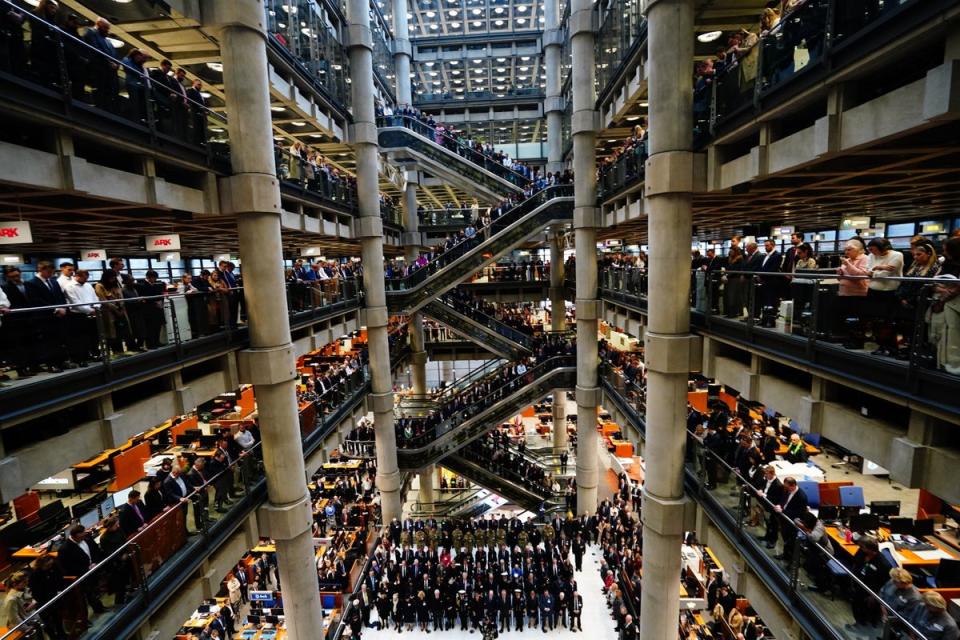 11 November 2022: City workers attend a Remembrance Day ceremony at Lloyd's of London, in the City of London, to mark Armistice Day, the anniversary of the end of the First World War (PA)