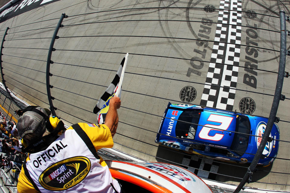 BRISTOL, TN - MARCH 18: Brad Keselowski, driver of the #2 Miller Lite Dodge, crosses the finishline to win the NASCAR Sprint Cup Series Food City 500 at Bristol Motor Speedway on March 18, 2012 in Bristol, Tennessee. (Photo by Justin Edmonds/Getty Images for NASCAR)