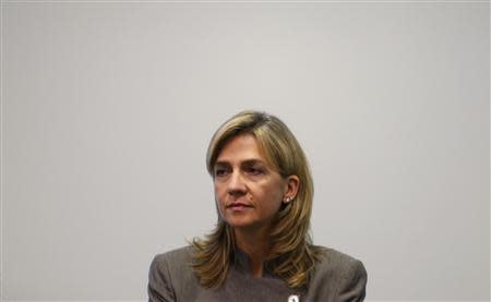 Spain's Infanta Cristina attends a news conference in Mexico City in this September 7, 2009 file photo. A Spanish judge charged Princess Cristina - younger daughter of King Juan Carlos - with tax fraud and money laundering, possibly paving the way to an unprecedented trial of a member of the royal family, the Superior Justice Tribunal of the Balearic Islands said on January 7, 2014. REUTERS/Daniel Aguilar/Files