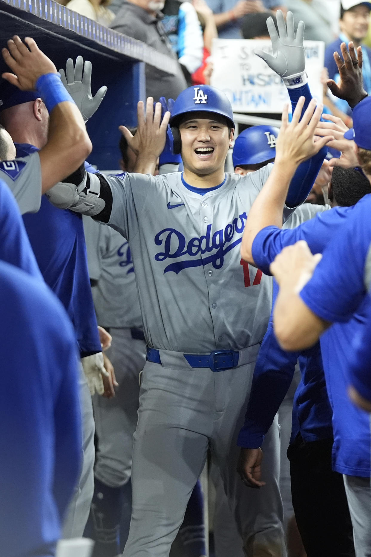 Los Angeles Dodgers' Shohei Ohtani (17) celebrates after hitting a home run during the sixth inning of a baseball game against the Miami Marlins, Thursday, Sept. 19, 2024, in Miami. (AP Photo/Marta Lavandier)