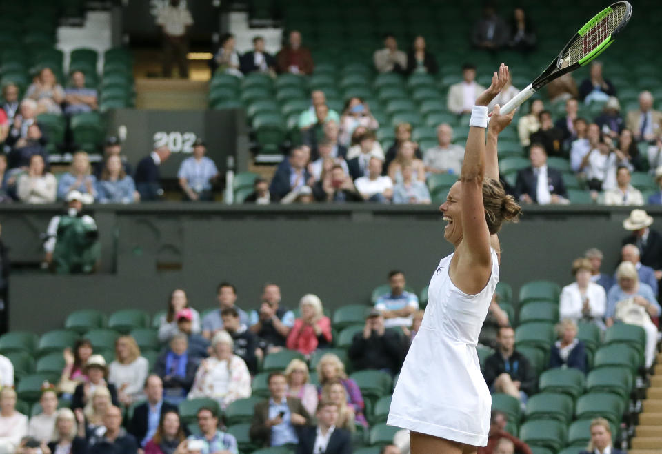 Czech Republic's Barbora Strycova, right, and Taiwan's Su-Wei Hsieh celebrate defeating Canada's Gabriela Dabrowski and China's Yifan Xu in the women's doubles final match of the Wimbledon Tennis Championships in London, Sunday, July 14, 2019. (AP Photo/Tim Ireland)