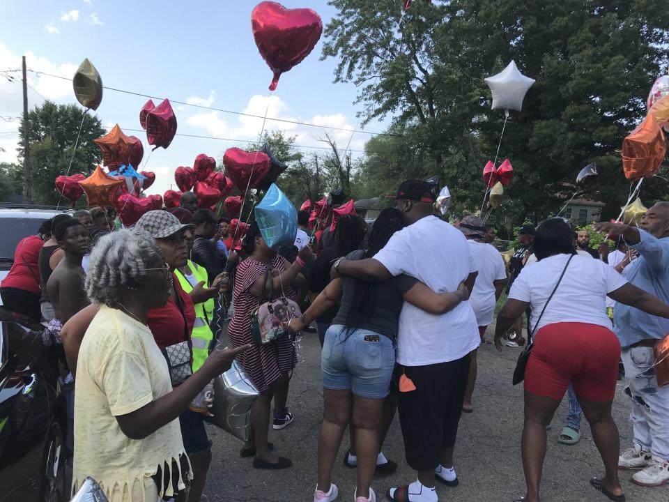 Dozens of family members, friends and community members gathered on Aug. 4, 2023, near the intersection of East 34th Street and North Parker Avenue for a balloon release for Gary Dwayne Harrell, who was shot and killed by an IMPD officer on Aug. 3, 2023.