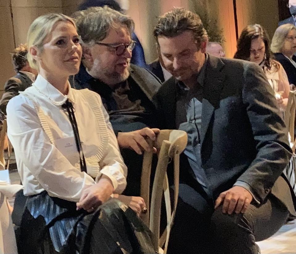 “Nightmare Alley” co-writer Kim Morgan and director Guillermo del Toro with producer Bradley Cooper at the 2022 Oscar Nominees luncheon - Credit: Anne Thompson