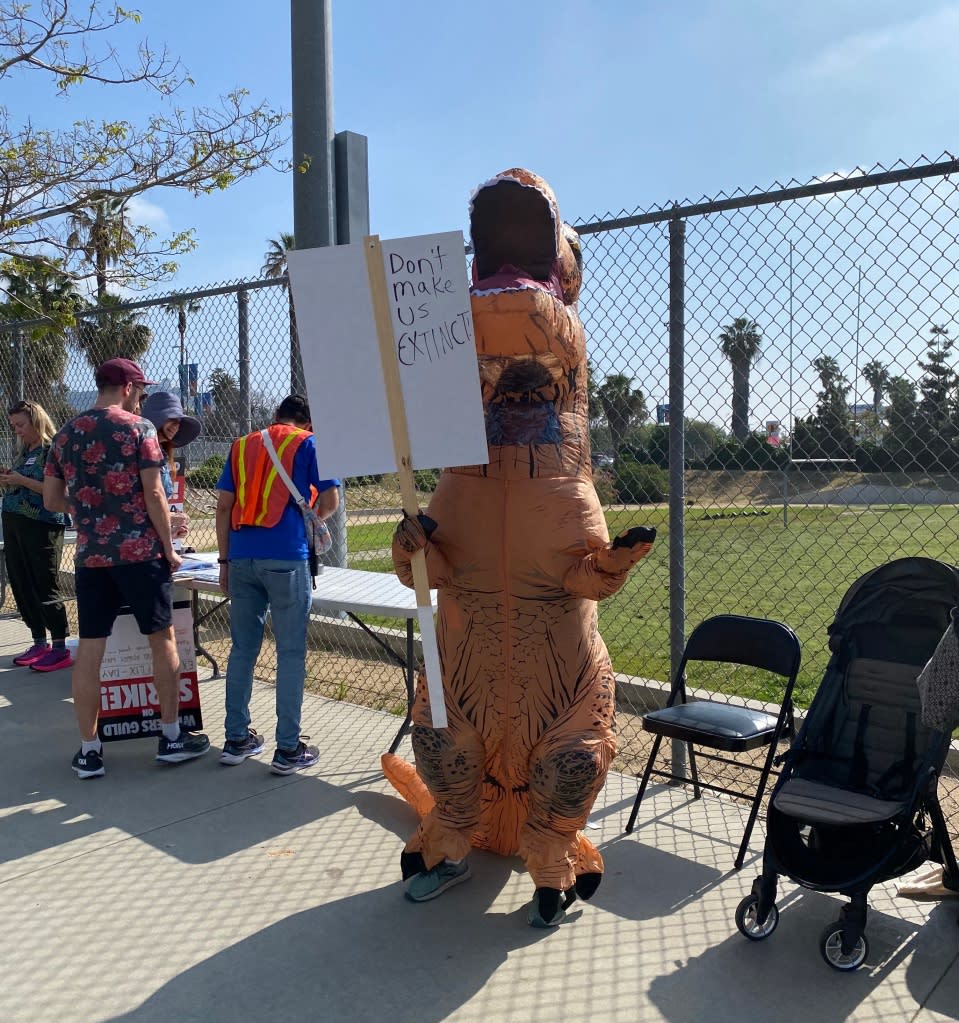 Striking writer Cindy Appel donned a dino costume for the family-themed picket outside Netflix offices in Hollywood