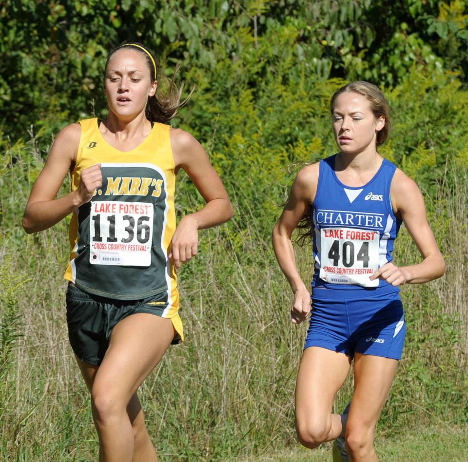 Emily Frydrych of St. Marks leads Charter of Wilmington's Julie Macedo early in the run of the Varsity Girls A Division of the Lake Forest Invitational in 2010 which Macedo eventually won.