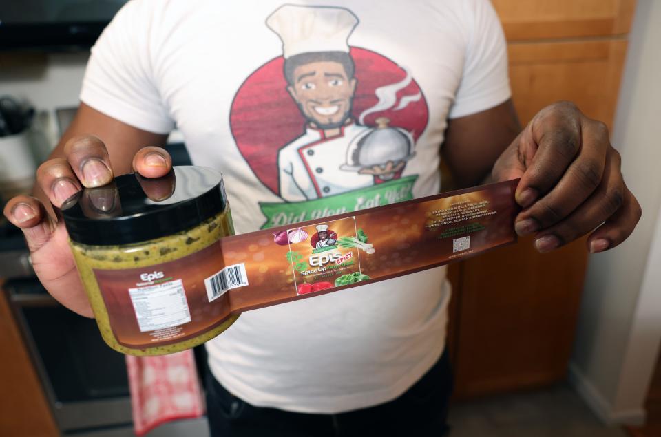 Mirbentz Jean Francois of Brockton, seen here on Saturday, Jan. 7, 2023, is founder of Did You Eat LLC, which sells its iconic Haitian seasoning sauce epis in local grocery stores.