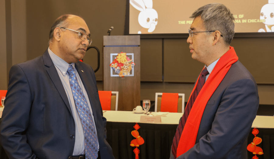 Tony Joseph (left), president of Joseph International in Muscatine and longtime member of the Muscatine China Initiative Committee, speaks with Consul General Zhao Jian Feb. 1, 2023.