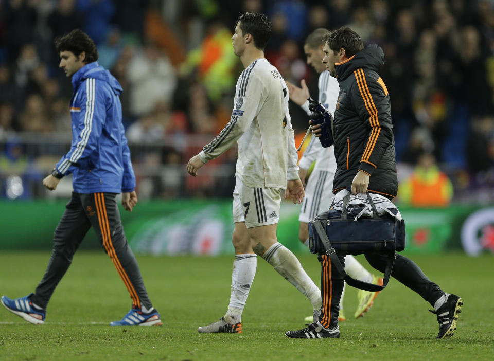 Real's Cristiano Ronaldo leaves the game during a Champions League quarterfinal first leg soccer match between Real Madrid and Borussia Dortmund at the Santiago Bernabeu stadium in Madrid, Spain, Wednesday April 2, 2014. (AP Photo/Paul White)