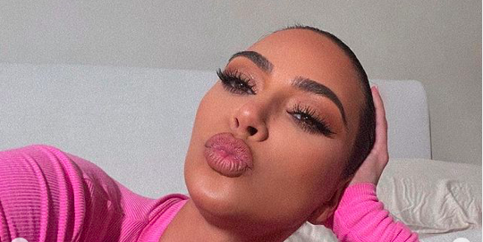 Kim Kardashian just posted a bunch of semi-naked photos on Instagram, and  the pics are bizarre