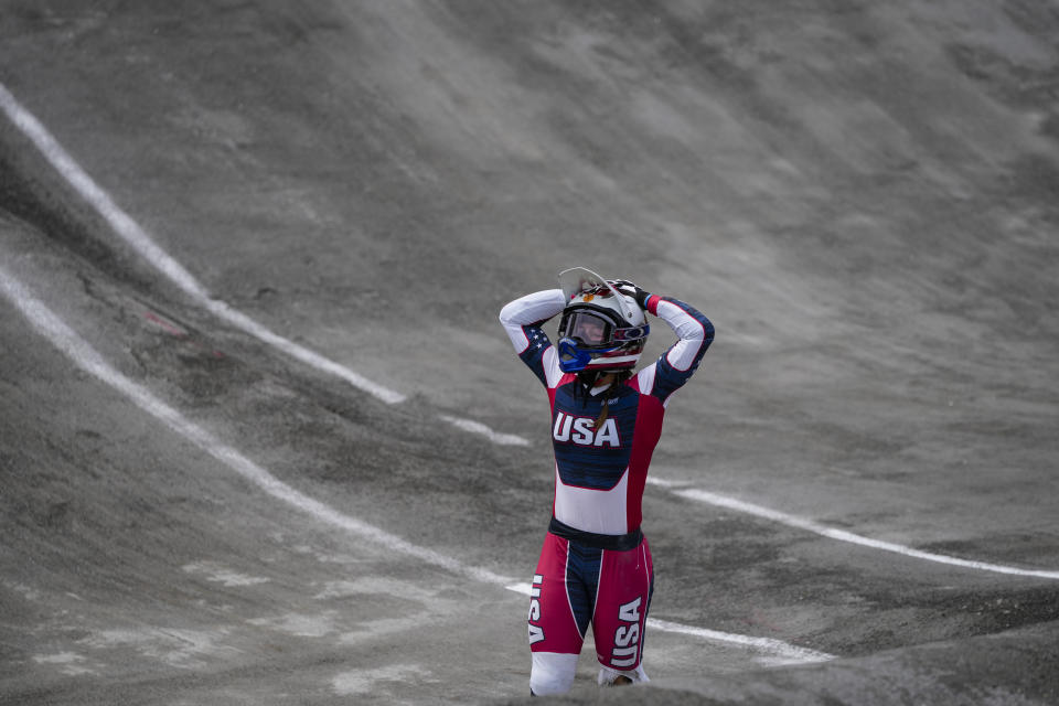 FILE - Alise Willoughby, of the United States, puts her hands on her head after crashing in the BMX Racing semifinals at the 2020 Summer Olympics, Friday, July 30, 2021, in Tokyo, Japan. (AP Photo/Ben Curtis, File)