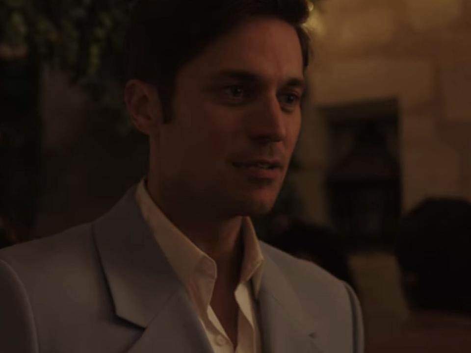 gabriel at his engagement party on emily in paris season three episode 10