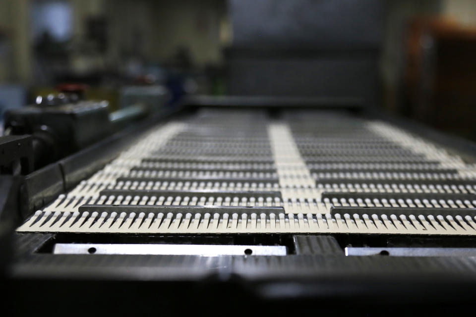 Parts of matchbooks roll off an assembly line at a Nittosha factory in Himeji, Japan, Wednesday, June 29, 2022. Nittosha, a small Japanese manufacturer, is stopping the production of matchbooks. The company, which employs 130 people, is a testament to the hard work and dedication at small and medium-size companies that are the backbones of large economies, including the U.S. and Japan. (AP Photo/Yuri Kageyama)