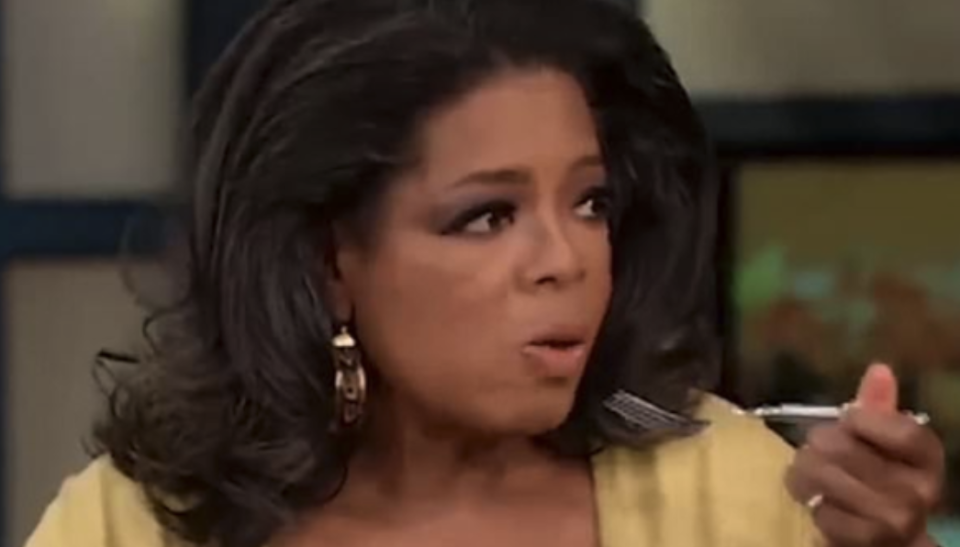 Oprah stopping mid-bite