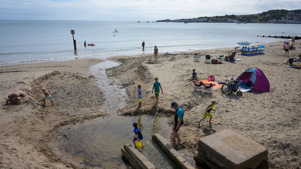 Storm overflow pipes often disgorge their contents onto beaches, like this one in Swanage, Kent. - Finnbarr Webster/Getty Images