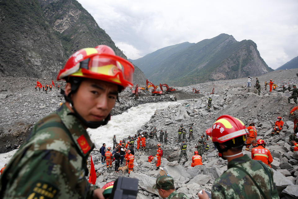 Rescue workers search for survivors