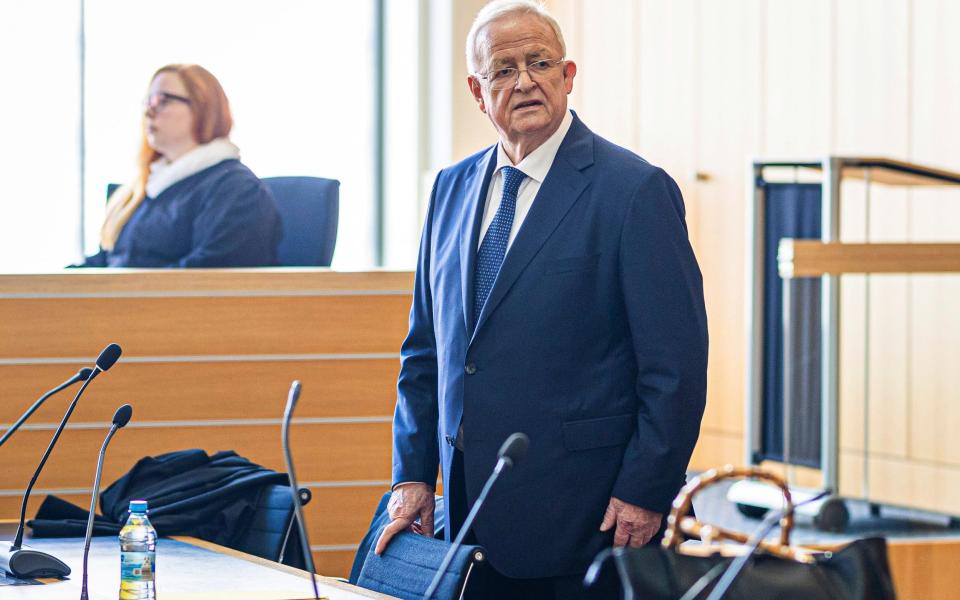 Former Volkswagen chief executive Martin Winterkorn stands in a hall of the Braunschweig Regional Court in Germany