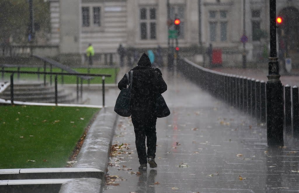 Further cold weather and rain is predicted for this weekend (Steve Parsons/PA) (PA Wire)