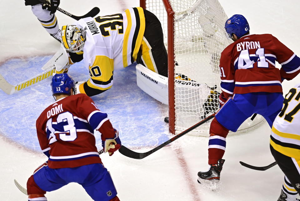 Montreal Canadiens' Paul Byron (41) scores on Pittsburgh Penguins goaltender Matt Murray (30) during second period NHL Eastern Conference Stanley Cup playoff action in Toronto on Wednesday, Aug. 5, 2020. (Frank Gunn/The Canadian Press via AP)