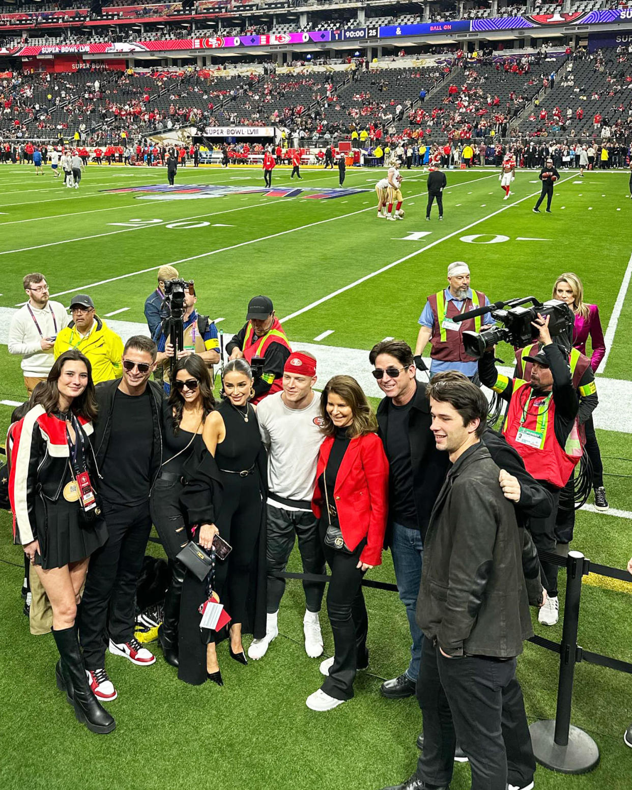 Olivia Culpo and Christian McCaffrey with loved ones at the 2024 Super Bowl in Las Vegas. (@oliviaculpo via Instagram)