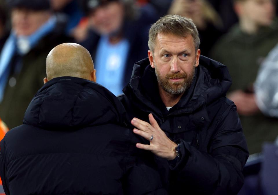 Chelsea manager Graham Potter with Manchester City manager Pep Guardiola (REUTERS)