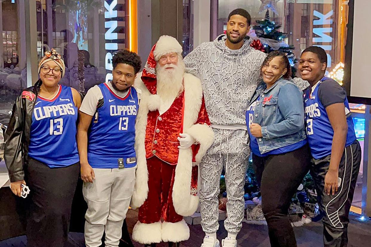 Paul George Holiday party