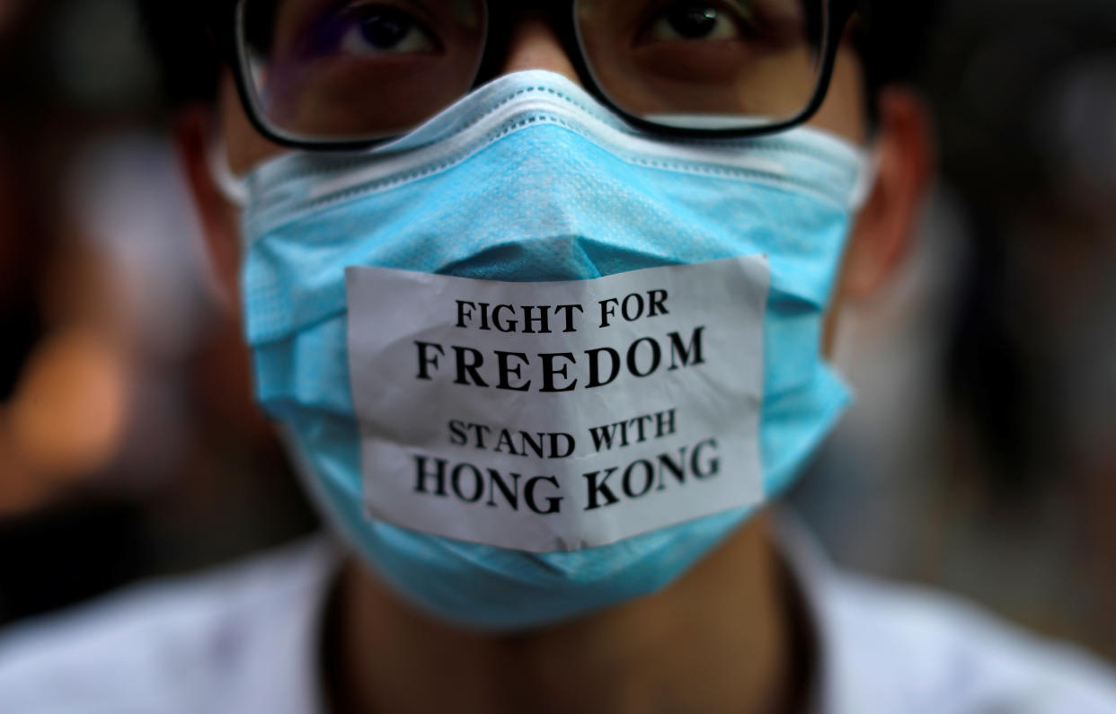 A masked anti-government protester is pictured in Central Hong Kong, China October 4, 2019. REUTERS/Jorge Silva