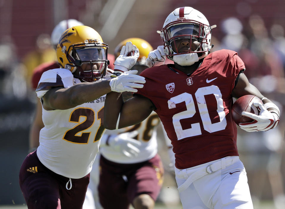 Stanford’s Bryce Love (R) already has 1,088 yards this season. (AP Photo/Marcio Jose Sanchez)