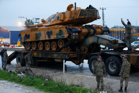 A Turkish military convoy arrives at an army base in the border town of Reyhanli near the Turkish-Syrian border in Hatay province, Turkey January 17, 2018. REUTERS/Osman Orsal