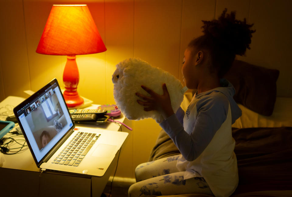 Joy Malone's daughter speaks to her kindergarten classmates on a Zoom call for the first time since schools were closed due to the coronavirus disease (COVID-19) outbreak in New Rochelle, New York, U.S., April 15, 2020. Picture taken April 15, 2020.  REUTERS/Joy Malone