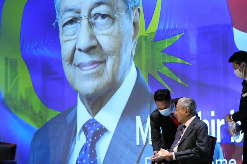 Malaysia's former Prime Minister Mahathir Mohamad prepares to answer questions at a session of the International Conference on "The Future of Asia" Friday, May 27, 2022 in Tokyo. (AP Photo/Eugene Hoshiko)