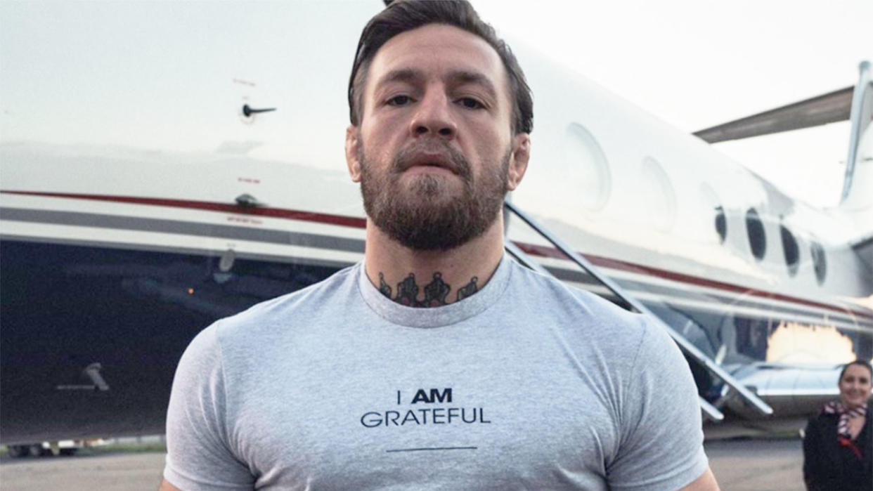 Pictured here, Conor McGregor standing in front of his private jet.