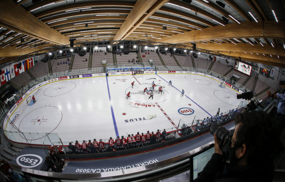 Play gets underway as Canada plays Finland during the first period of an IIHF women's hockey championship game in Calgary, Alberta, Friday, Aug. 20, 2021. (Jeff McIntosh/The Canadian Press via AP)