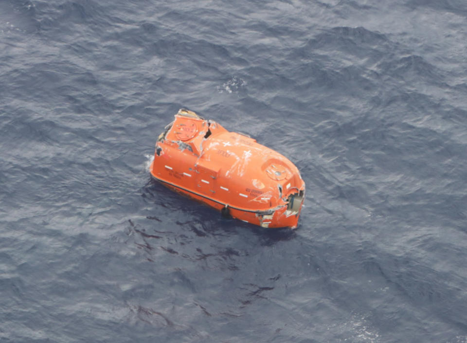 Image: An aerial view taken from an airplane of Japan Coast Guard shows a lifeboat believed to be belonging to the Gulf Livestock 1 in the East China Sea (Japan Coast Guard / Reuters)