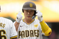 San Diego Padres' Ha-Seong Kim celebrates after hitting a single during the second inning of a baseball game against the Los Angeles Dodgers, Saturday, May 11, 2024, in San Diego. (AP Photo/Gregory Bull)