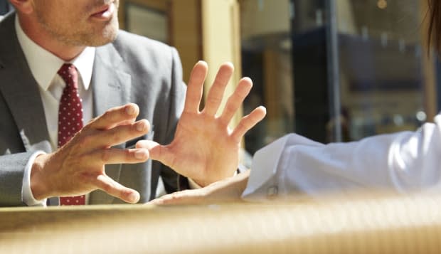 Business mans hands making a gesture