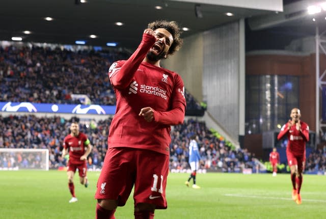 Mohamed Salah celebrates his hat-trick at Ibrox