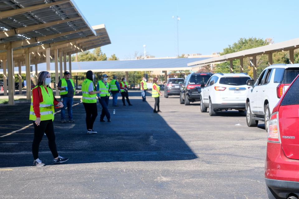 Staff members line up during the Thomas E. Creek VA Medical Center for the Welcome Home event for veterans in November 2021.