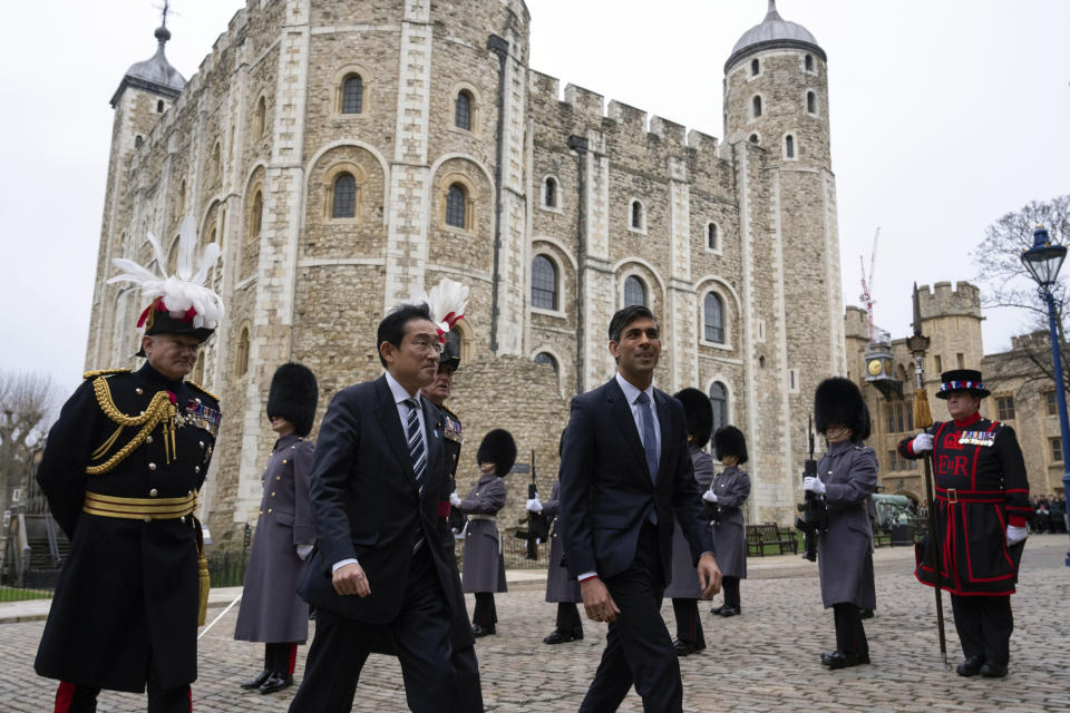 Britain's Prime Minister Rishi Sunak, right, and Japan's Prime Minister Fumio Kishida, centre, arrive at the Tower of London, Wednesday, Jan. 11, 2023. The leaders of Britain and Japan are signing a defense agreement on Wednesday that could see troops deployed to each others’ countries. (Carl Court/Pool Photo via AP, File)