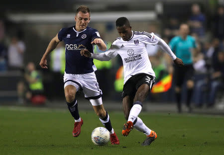 Soccer Football - Championship - Millwall v Fulham - The Den, London, Britain - April 20, 2018 Fulham's Ryan Sessegnon in action with Millwall's Jed Wallace Action Images/Matthew Childs