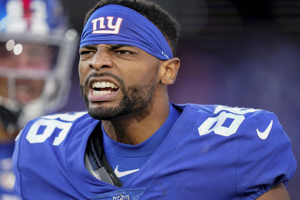 New York Giants wide receiver Darius Slayton (86) celebrates after scoring a touchdown against the Houston Texans during the third quarter of an NFL football game, Sunday, Nov. 13, 2022, in East Rutherford, N.J. (AP Photo/John Minchillo)