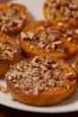 <p>Forget mini marshmallows! Pimp out your sweet potatoes with maple syrup and pecans.</p><p>Get the recipe from <a href="https://www.delish.com/cooking/recipe-ideas/recipes/a50767/melting-sweet-potatoes-recipe/" rel="nofollow noopener" target="_blank" data-ylk="slk:Delish;elm:context_link;itc:0;sec:content-canvas" class="link ">Delish</a>.</p>