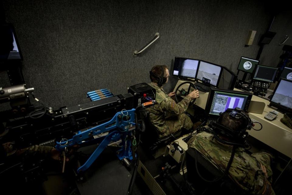 U.S. Army Soldiers with the New Jersey National Guard’s D Company, 1-114th Infantry Regiment (Air Assault) practice on a Virtual Convoy Operations Trainer (VCOT) at the Observer Coach/Trainer Operations Group Regional Battle Simulation Training Center on Joint Base McGuire-Dix-Lakehurst, N.J., Feb. 9, 2020.