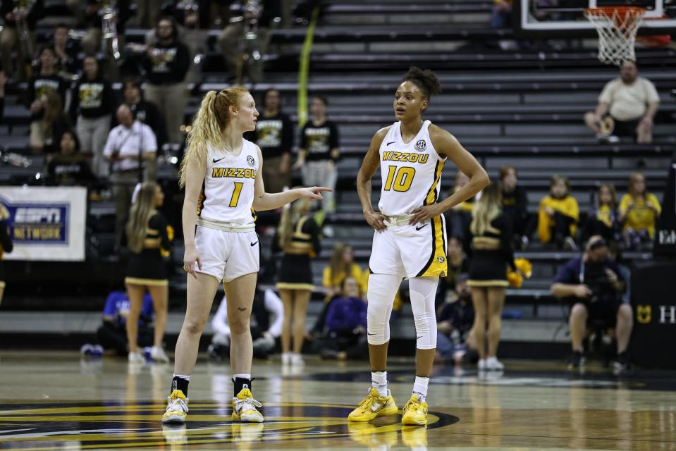 Missouri guards Lauren Hansen and Katlyn Gilbert discuss strategy on the court on Dec. 29, 2022, during the Tigers' win over Kentucky at Mizzou Arena in Columbia, Mo.