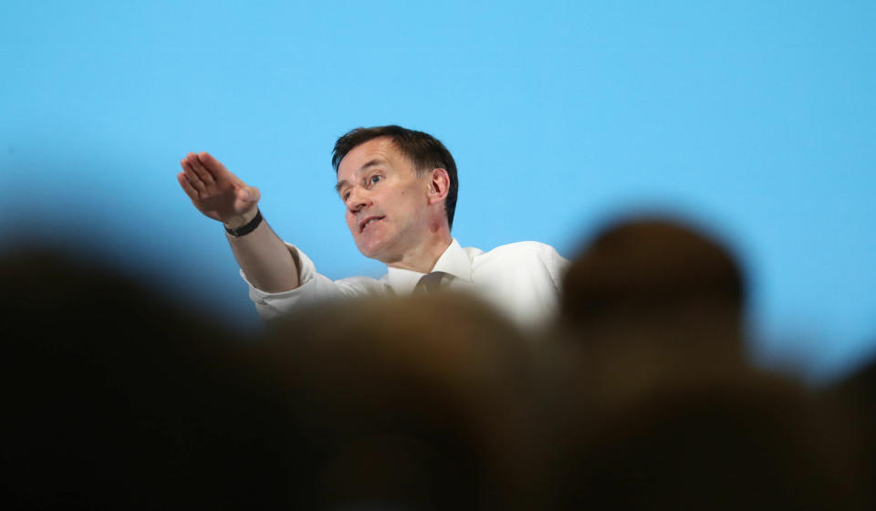 Britain's Conservative Party leadership candidate Jeremy Hunt addresses the audience during a party leadership hustings meeting in Maidstone, southern England, Thursday July 11, 2019. The two contenders, Jeremy Hunt and Boris Johnson are competing for votes from party members, with the winner replacing Prime Minister Theresa May as party leader and Prime Minister of Britain's ruling Conservative Party. (Gareth Fuller/PA via AP)