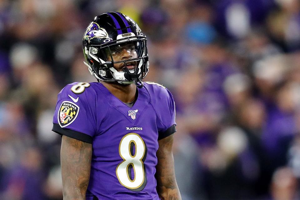 Lamar Jackson of the Baltimore Ravens reacts after throwing an incomplete pass during the first half against the Tennessee Titans in the AFC Divisional Playoff game at M&T Bank Stadium on January 11, 2020 in Baltimore, Maryland.