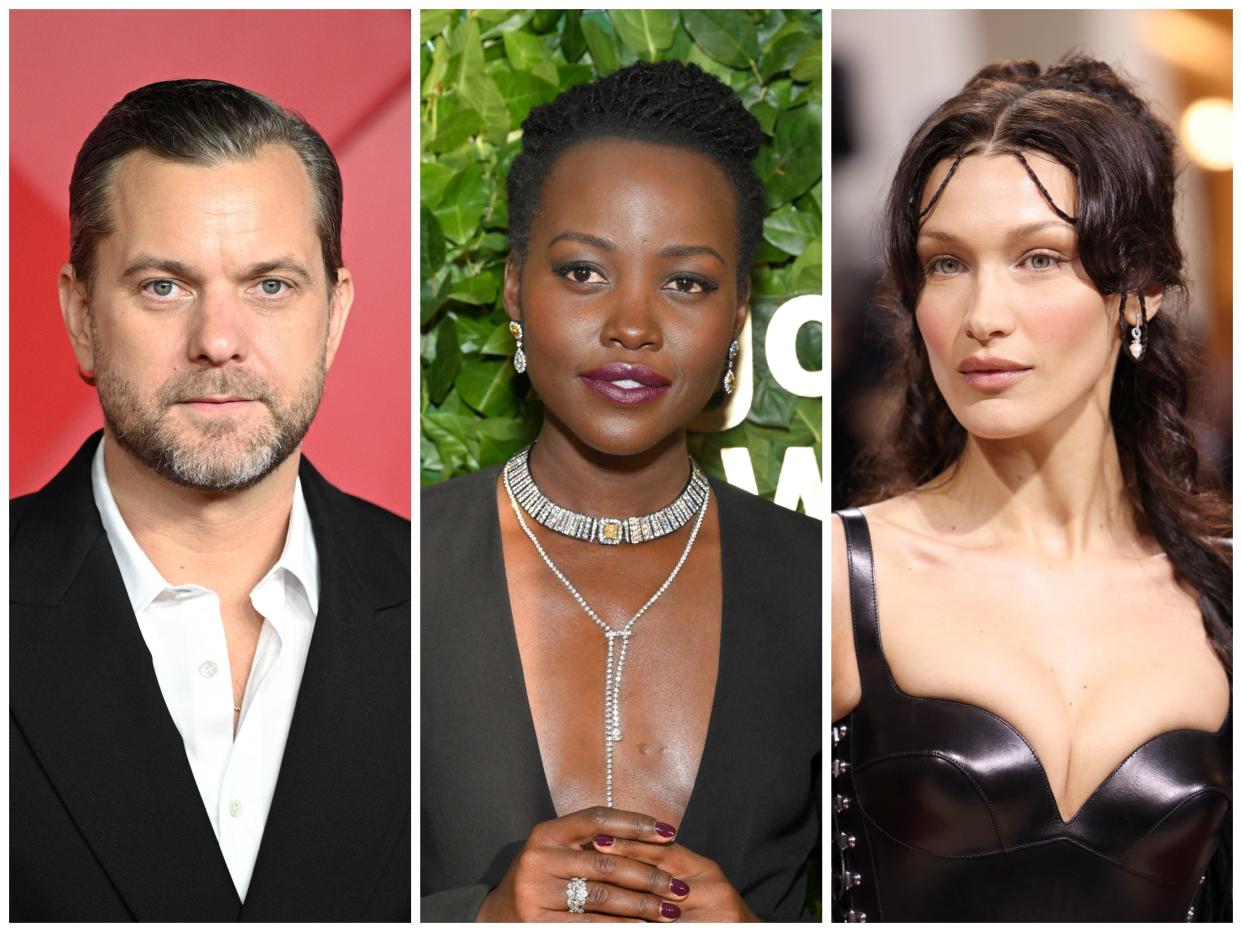 Joshua Jackson wears a black jacket and a white shirt in front of a red backdrop; Lupita Nyong'o wears a plunging black dress and silver necklaces in front of a green backdrop; Bella Hadid wears a black corset dress and small earrings at the 2022 Met Gala.