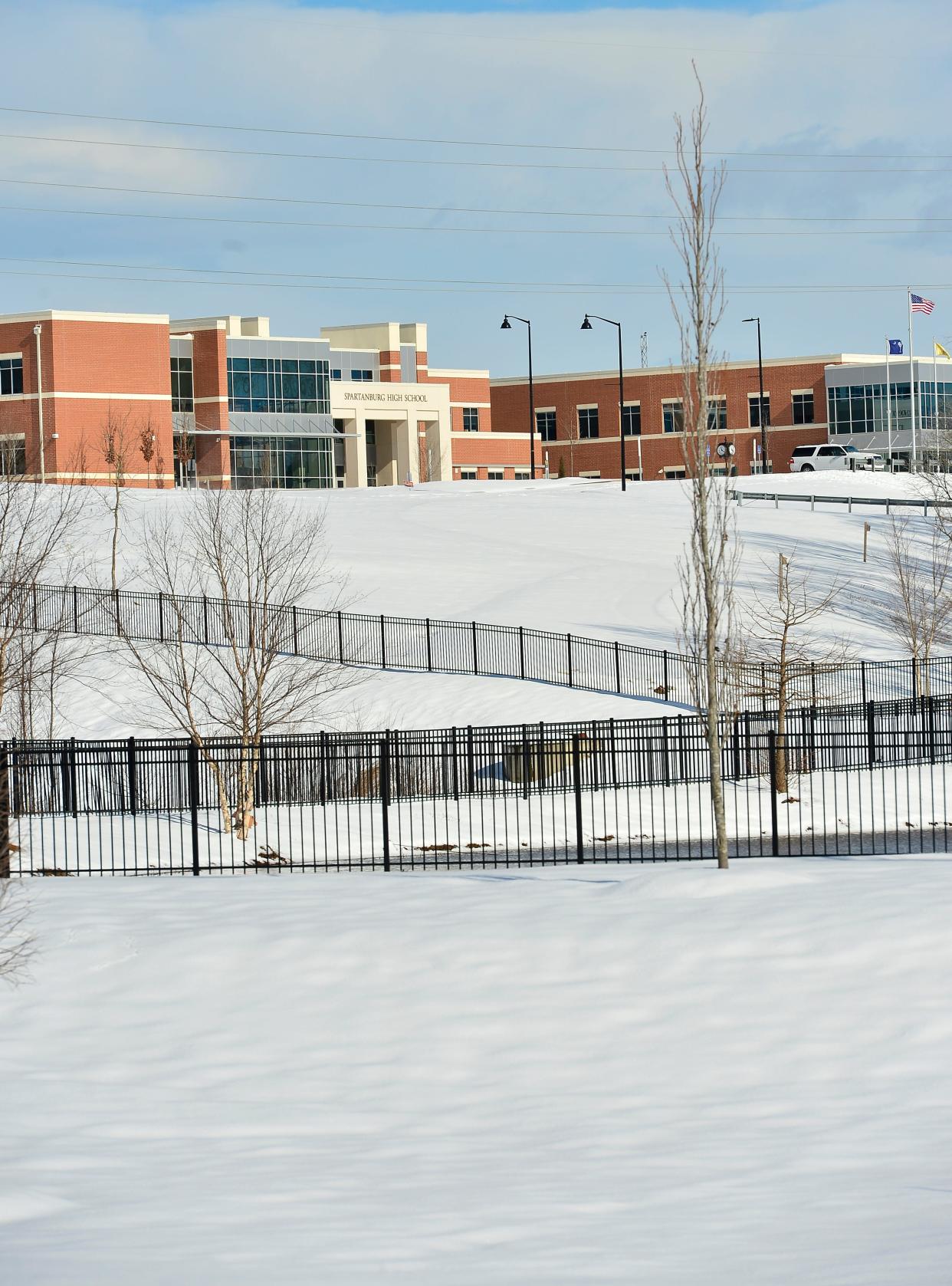 Snowfall in Spartanburg County has led to schools transitioning to eLearning and to athletics throughout the county being postponed.