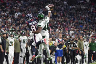 New York Jets cornerback Javelin Guidry (40) breaks up a pass intended for Houston Texans wide receiver Danny Amendola in the second half of an NFL football game in Houston, Sunday, Nov. 28, 2021. (AP Photo/Justin Rex)