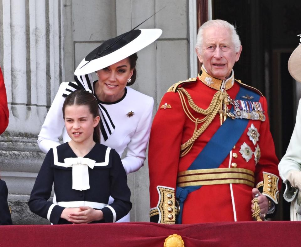 Kate Middleton with Princess Charlotte and King Charles. ZUMAPRESS.com